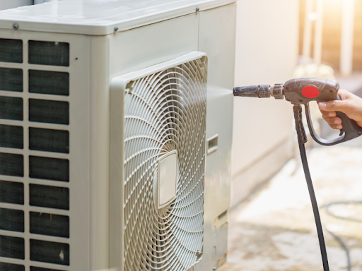 The Technician is cleaning the HVAC system as part of maintenance agreements for HVAC