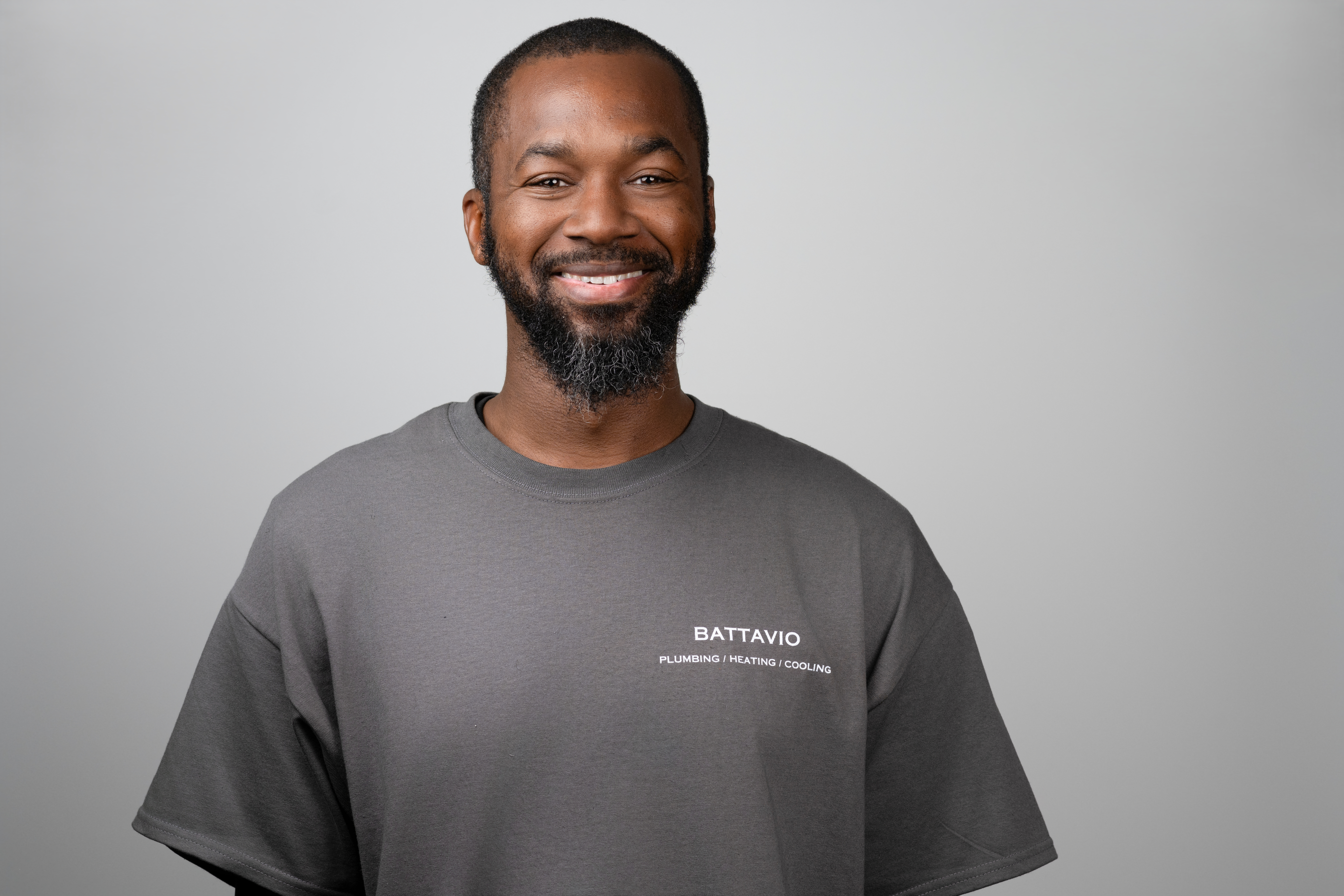 Battavio Plumbing Heating and Cooling Technician performing HVAC services, ensuring efficient cooling system maintenance and repairs in Chester County, PA