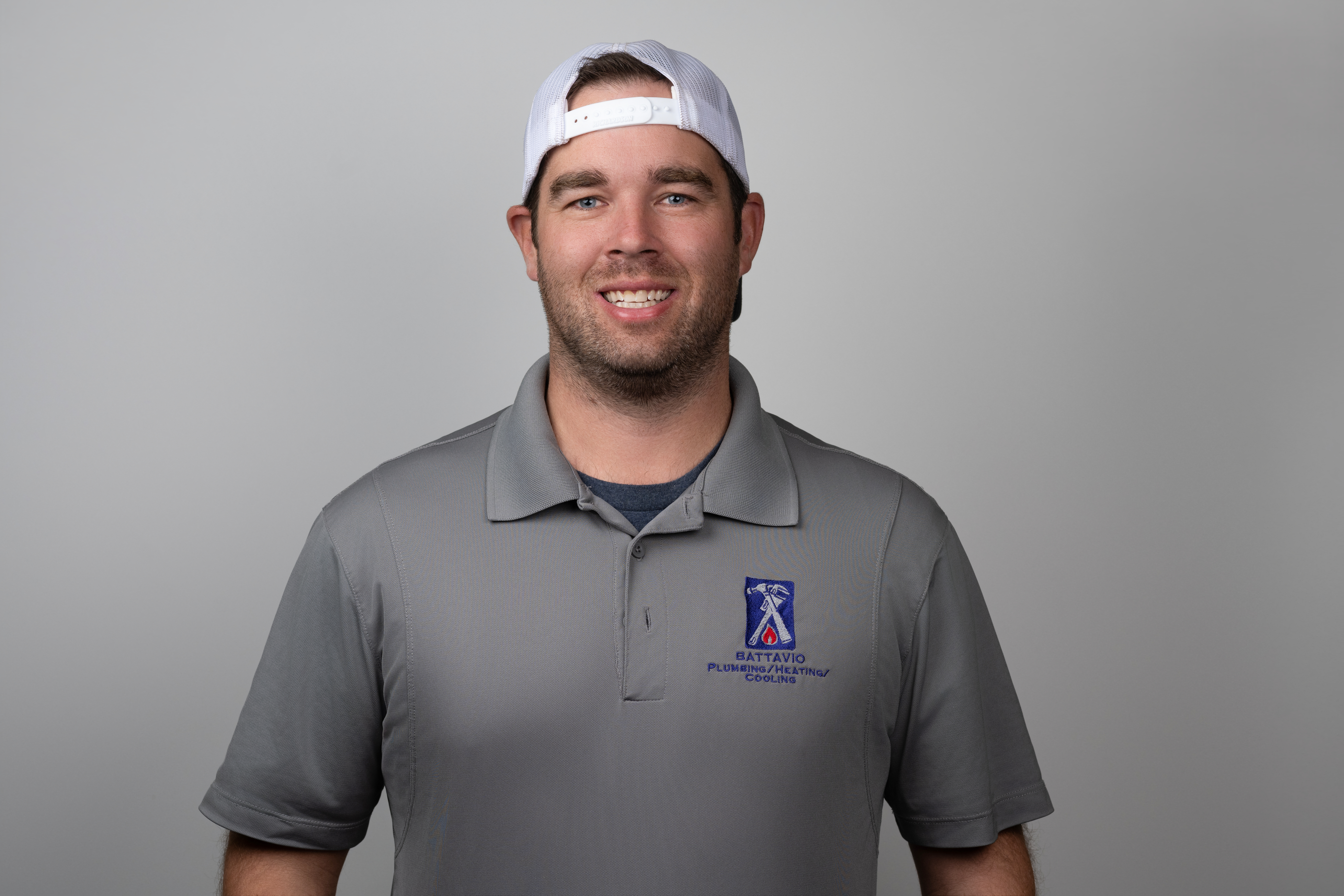 Battavio Plumbing Heating and Cooling Technician performing HVAC services, ensuring efficient cooling system maintenance and repairs in Chester County, PA