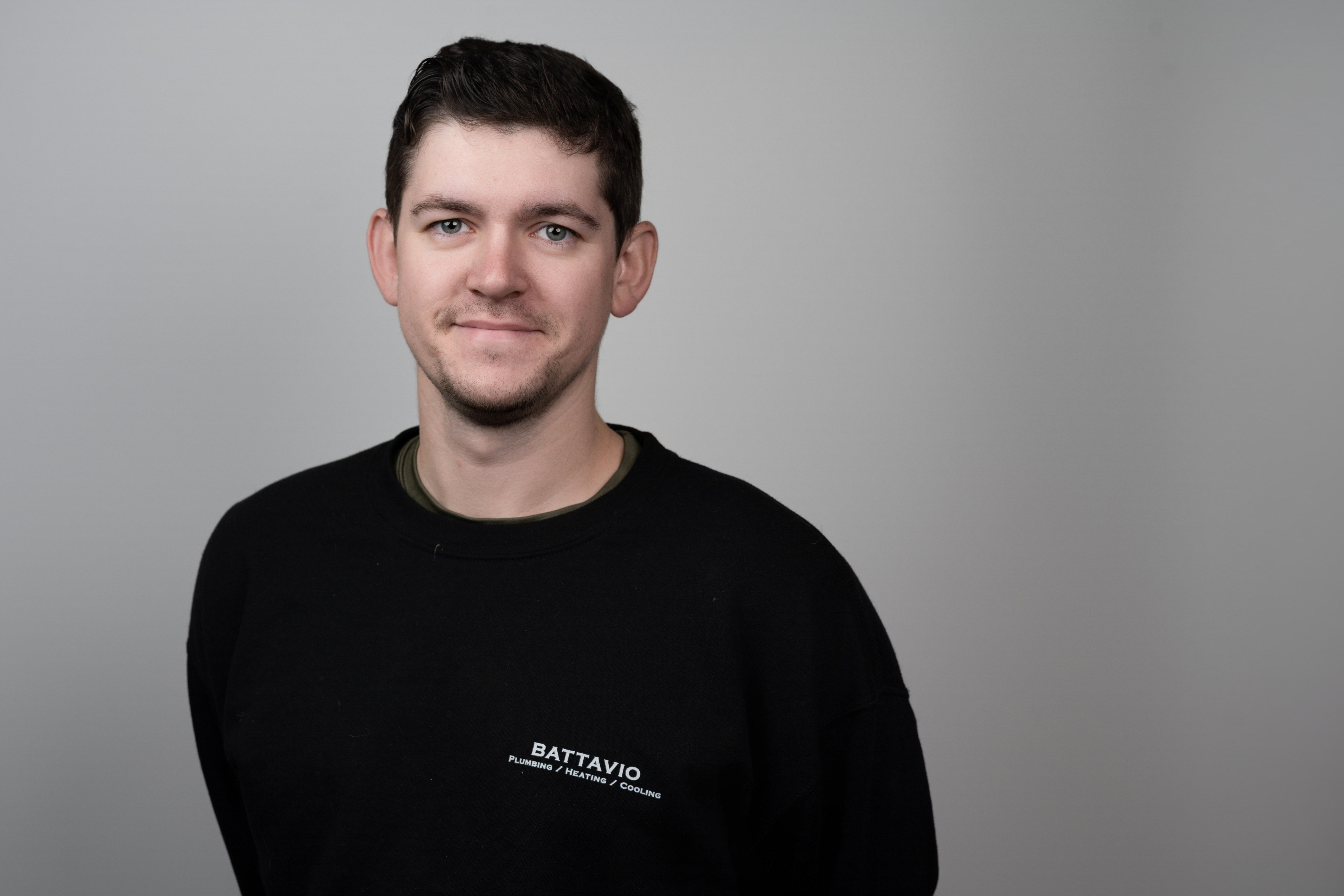 Battavio Plumbing Heating and Cooling Technician performing HVAC services, ensuring efficient cooling system maintenance and repairs in Chester County, PA