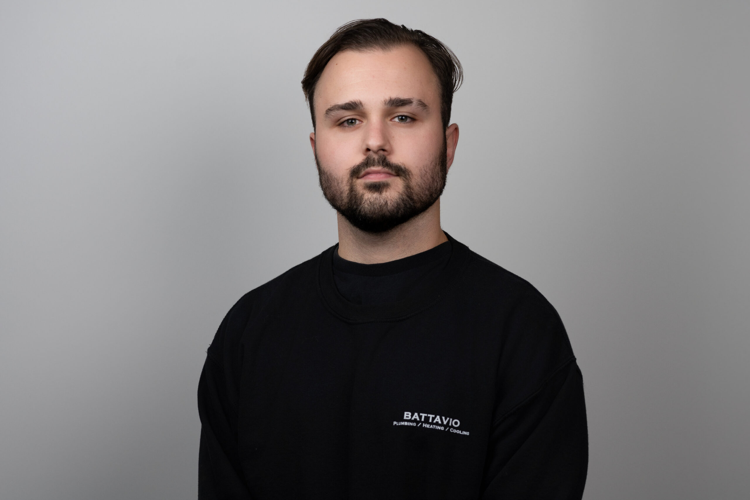 Battavio Plumbing Heating and Cooling Technician performing HVAC services, ensuring efficient cooling system maintenance and repairs in Chester County, PA