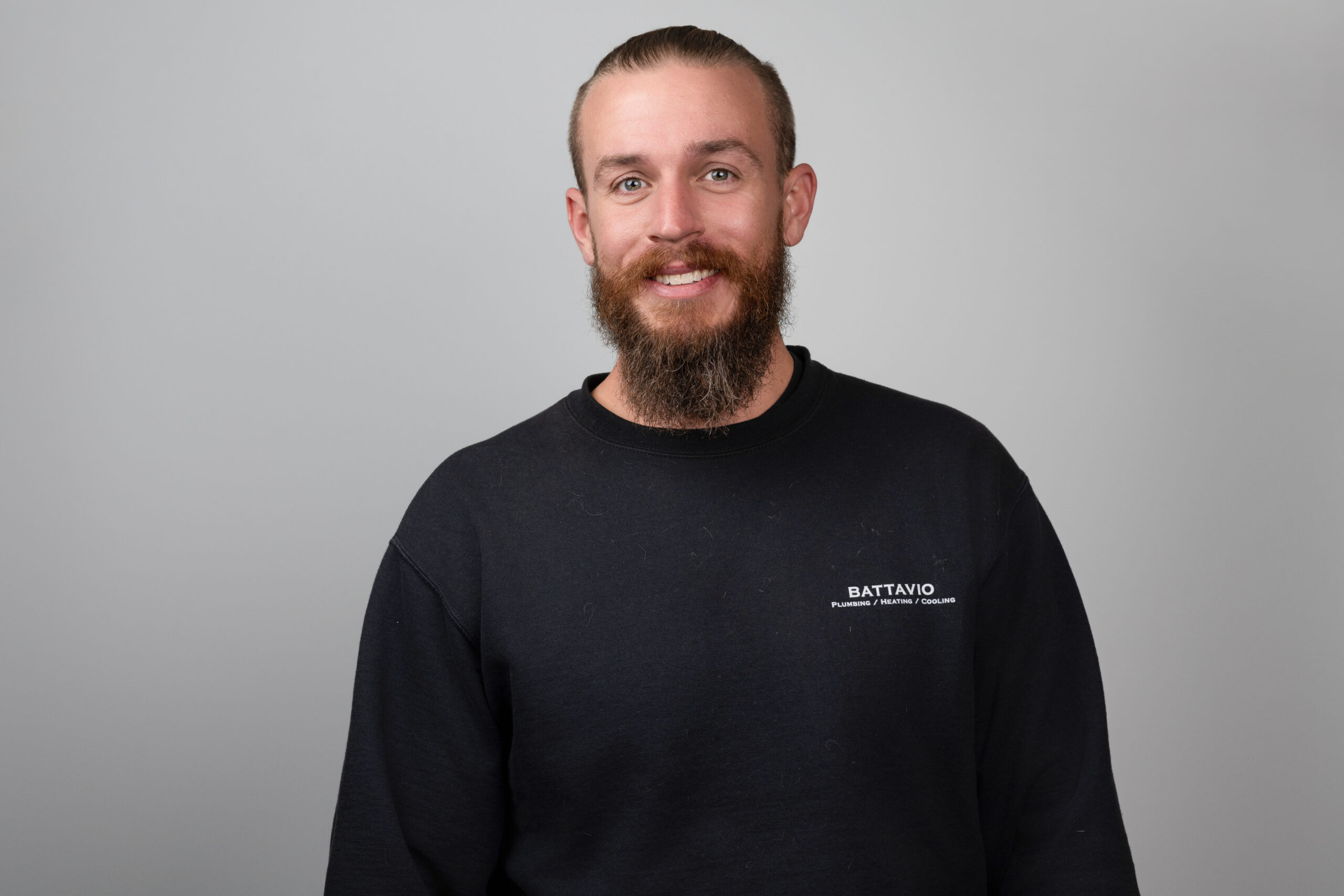 Battavio Plumbing Heating and Cooling Technician performing HVAC services, ensuring efficient cooling system maintenance and repairs in Chester County, PA