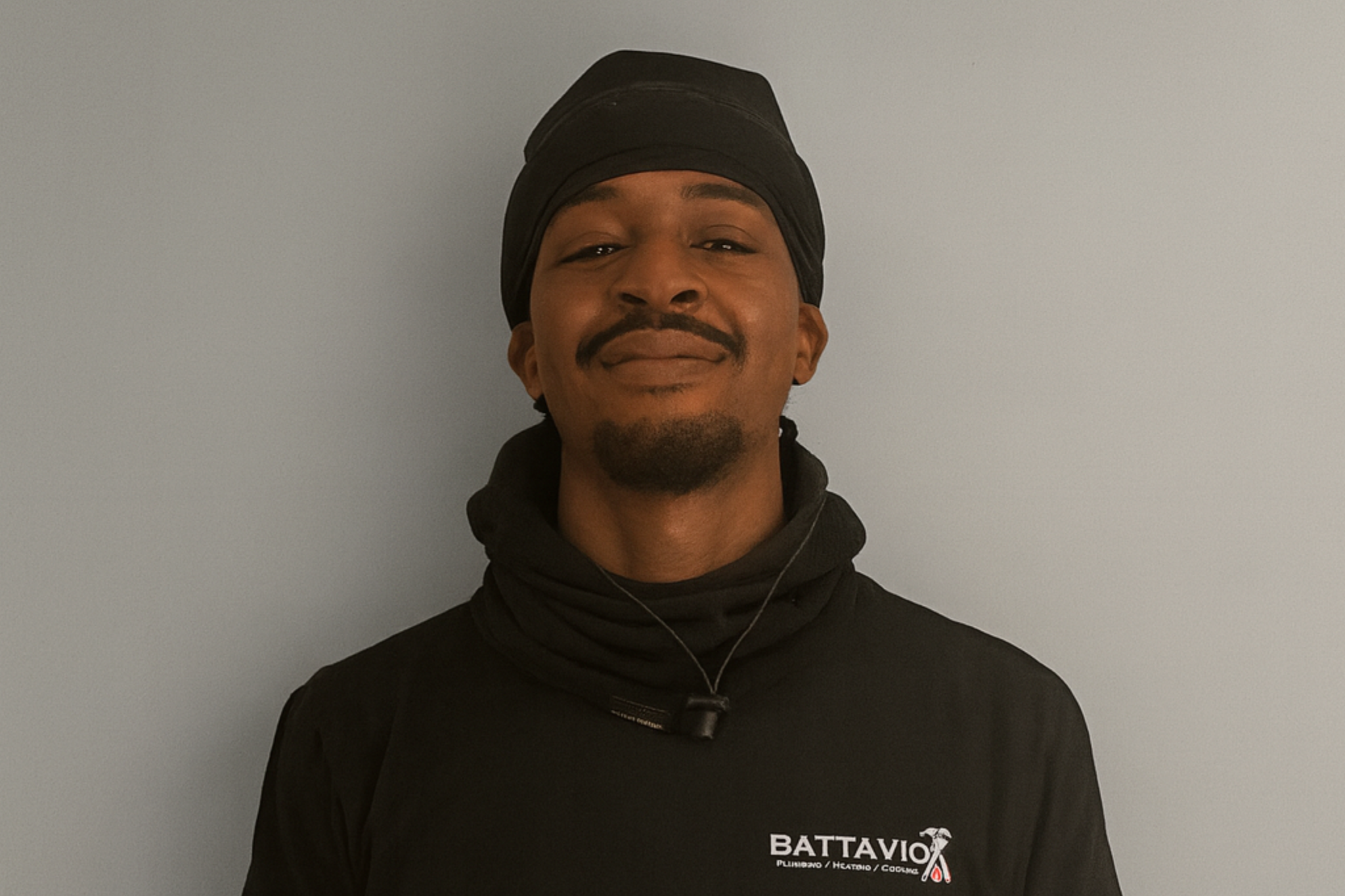 Battavio Plumbing Heating and Cooling Technician performing HVAC services, ensuring efficient cooling system maintenance and repairs in Chester County, PA